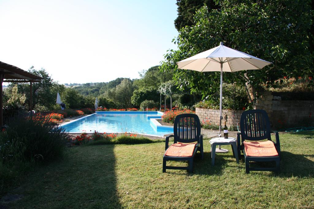 Le Valli Aparthotel Pomarance Bagian luar foto